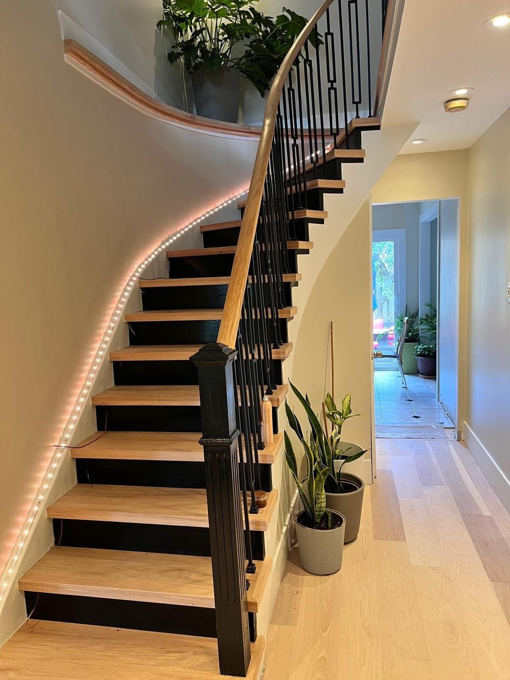 After: Staircase: carpet to hardwood stairs